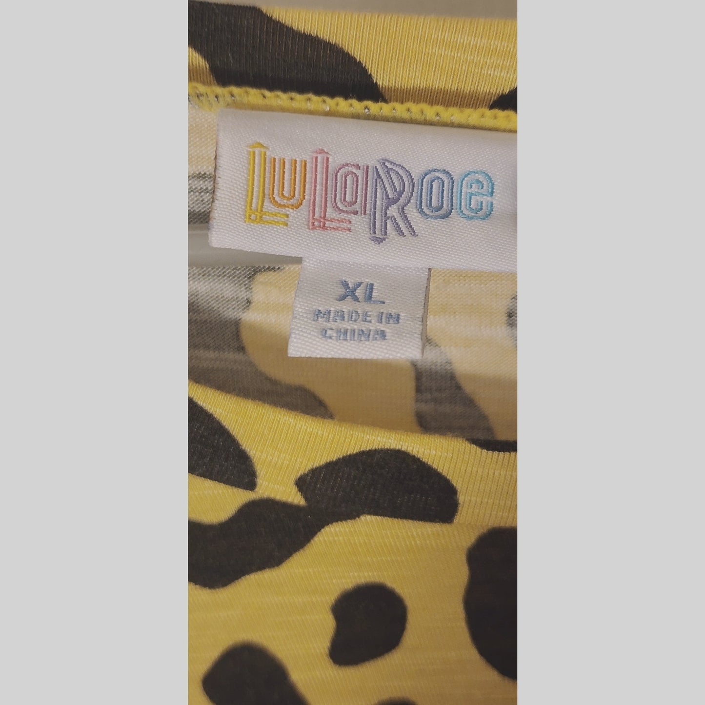 LuLaRoe Women’s XL Beige Black Leopard Print Short Sleeve Top