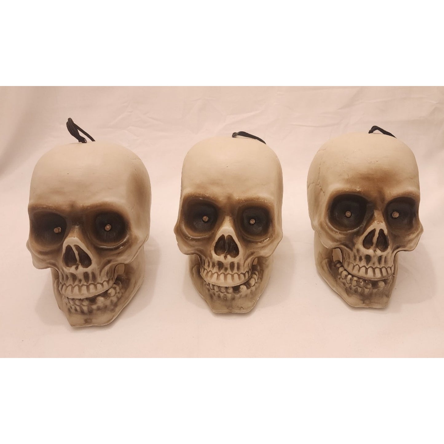 3 pack -Animated Lighting Hanging Skulls -Eyes light, mouth moves, sound effects